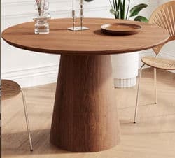 A modern round table featuring a thick tabletop and a tapering, conical pedestal base, both constructed from dark wood with a visible grain pattern. The design is minimalist and robust, emphasizing the natural beauty of the wood. — 3D model