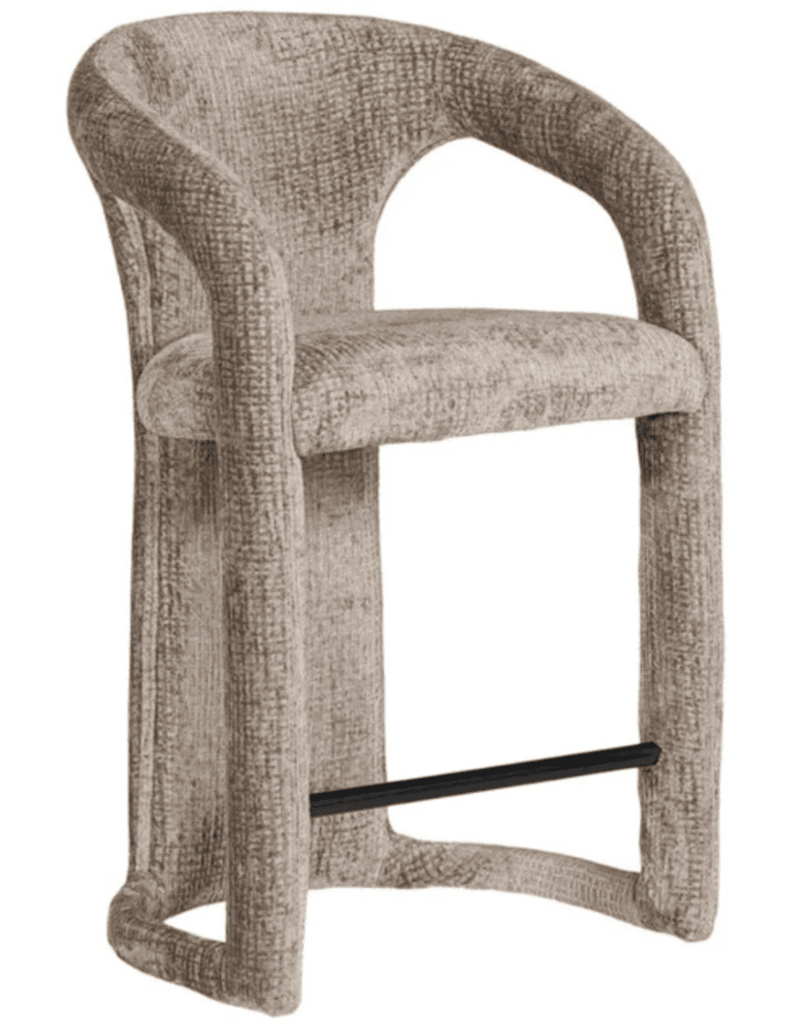 A contemporary armed bar stool featuring a fully upholstered frame in a textured beige fabric, characterized by its curvilinear design and integrated backrest and armrests. It includes a black metal footrest for added comfort. — 3D model