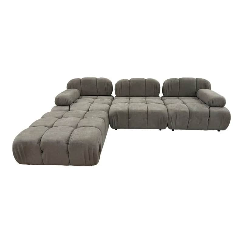 A sectional sofa with a modular design, featuring tufted cushions and rounded armrests. The sofa is… — 3D model