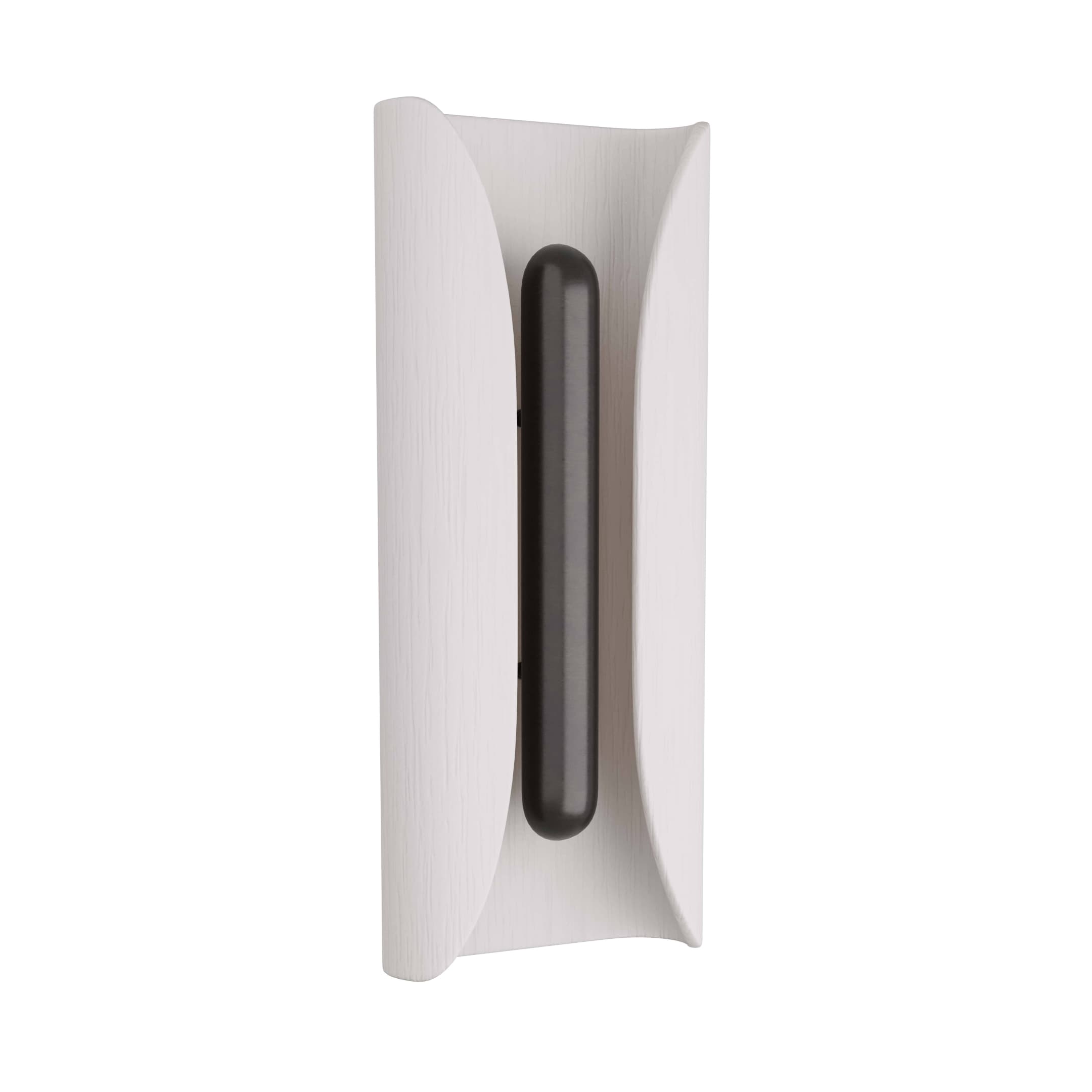 A modern wall sconce light featuring a curved, textured white outer shell and a dark, cylindrical light source positioned vertically in the center, designed for indirect wall illumination. — 3D model