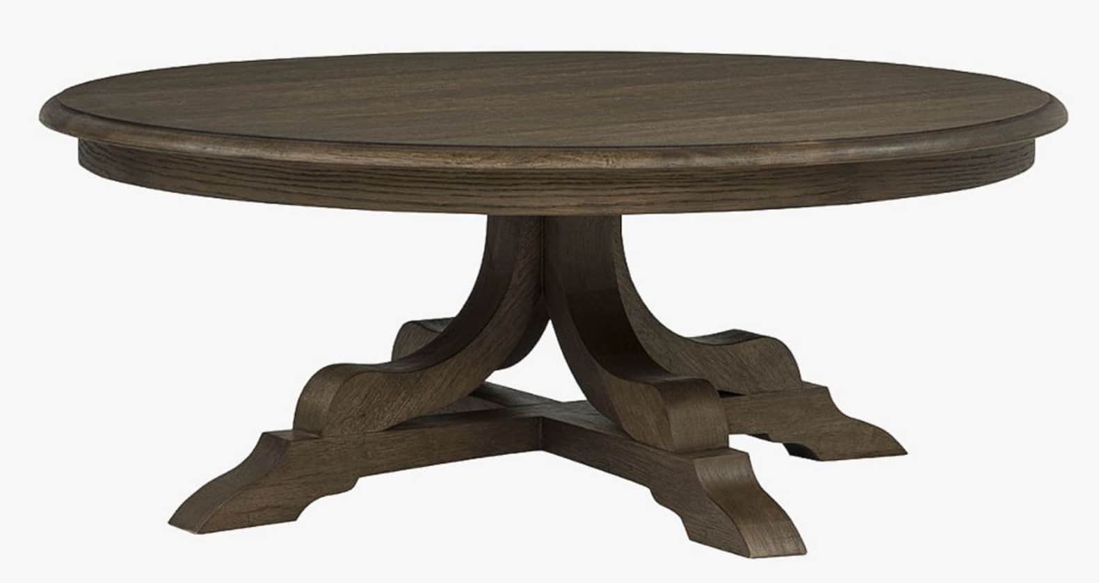 A dark brown, round dining table featuring a robust pedestal base. The tabletop appears to be constr… — 3D model