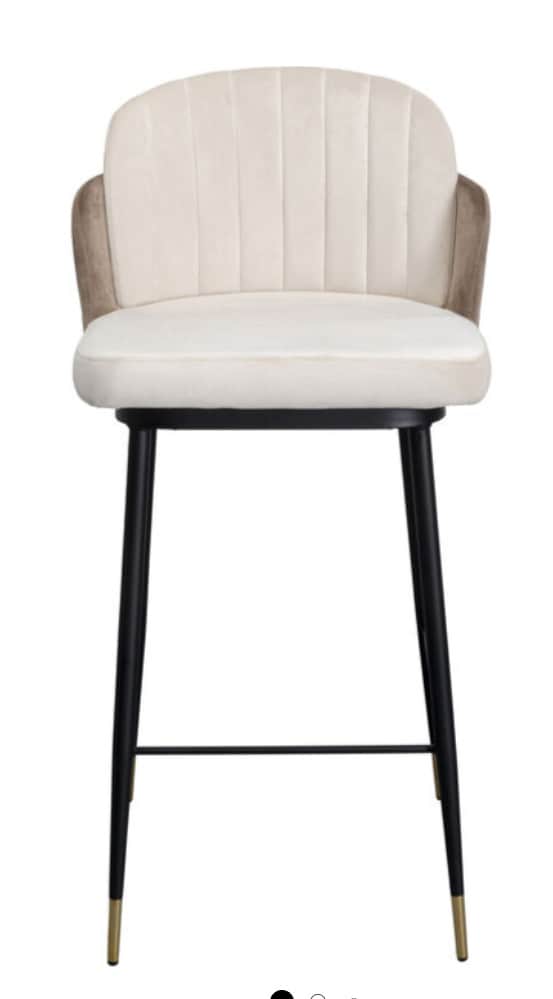A contemporary upholstered bar stool featuring a channel-tufted backrest and seat cushion in two-ton… — 3D model
