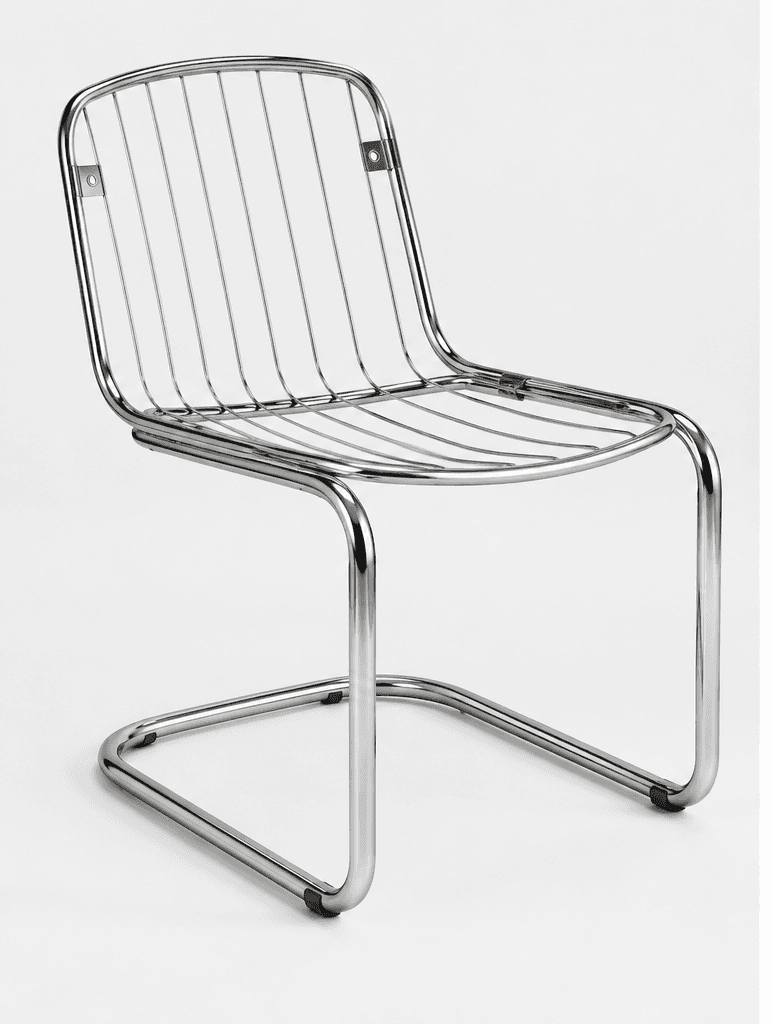 An armless cantilever chair featuring a chrome-plated tubular steel frame and a seat and back composed of horizontal chrome-plated steel wires. The chair rests on a bent tubular steel base that provides a slight spring, typical of cantilever designs. Black plastic glides are present at the base to protect surfaces. — 3D model