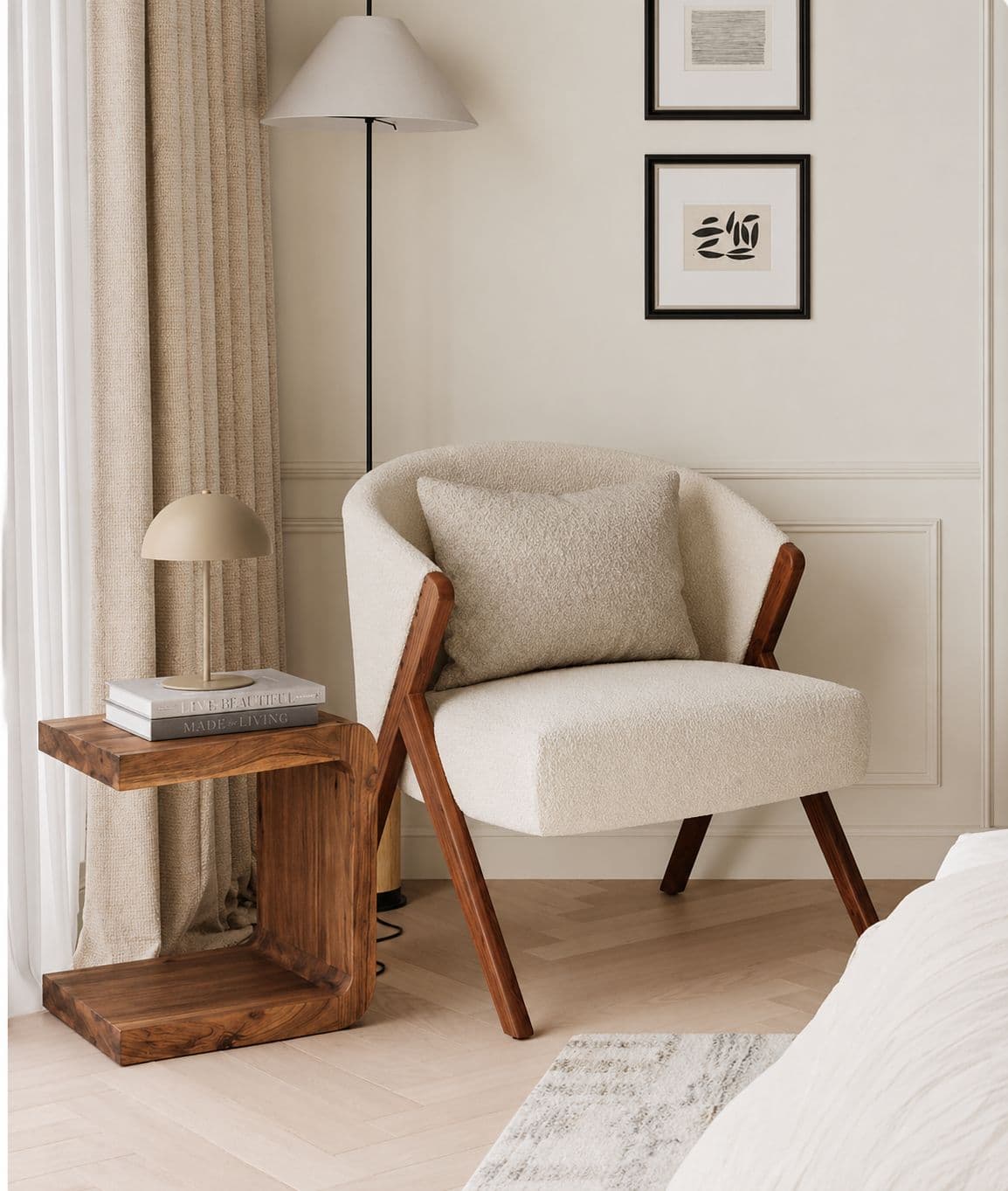 A contemporary armchair featuring an off-white bouclé upholstery and a distinctive exposed dark wood frame. The chair has a rounded backrest that integrates with the armrests, creating a cohesive, bucket-like form. A loose back cushion of the same material is included. The chair is supported by four angled, tapered wooden legs that are part of the exposed structural frame. — 3D model