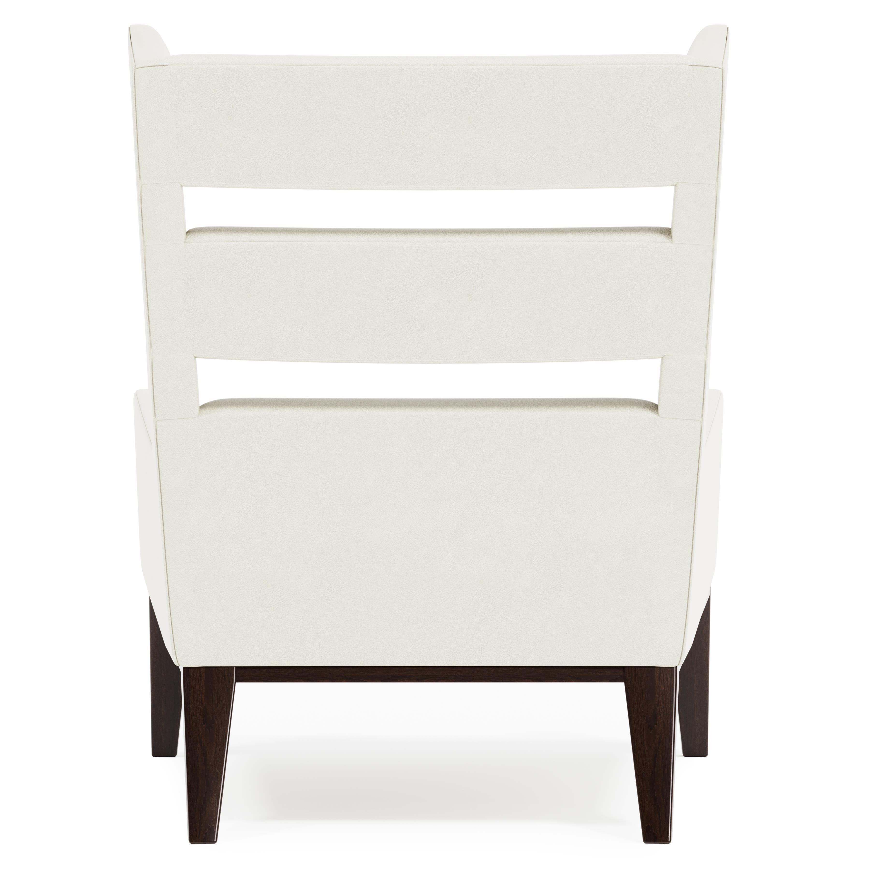 A modern armchair with a high back and a slatted design. The armchair features a cream-colored upholstered seat and back, supported by four dark wooden legs. The backrest has three horizontal slats, creating an open-weave effect. The upholstery appears to be a textured leather or leather-like material. — 3D model