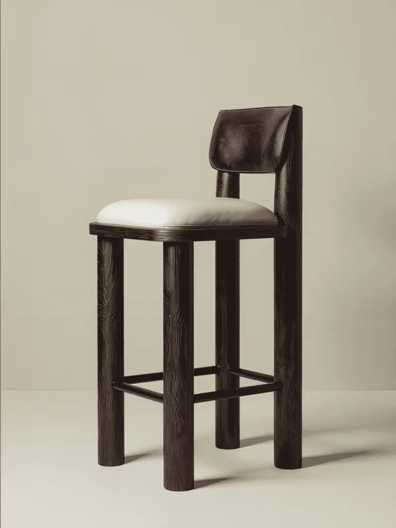 A dark brown wooden bar stool with a light-colored upholstered seat and a matching upholstered backrest. The stool has four thick, cylindrical legs with a visible wood grain texture. There are two horizontal supports connecting the legs for stability. The backrest is a single, slightly curved piece attached to the rear legs. — 3D model