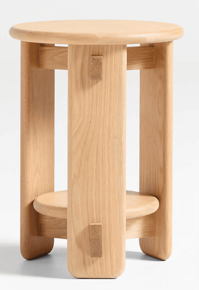 A minimalist natural ash wood stool featuring a round top, a smaller round lower shelf, and distinct… — 3D model