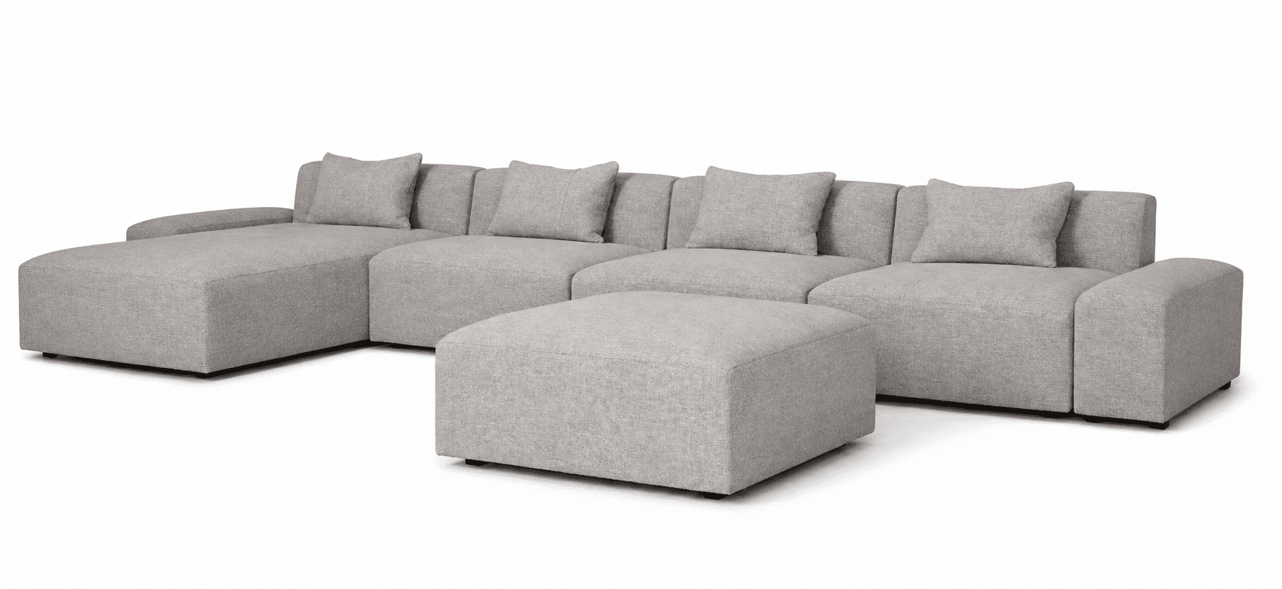 A modular sectional sofa with a chaise lounge component and a separate ottoman. The sofa features a low profile, square arms, and upholstered cushions. The fabric appears to be a textured woven material. The color is a neutral light gray. The modular design allows for various configurations. — 3D model