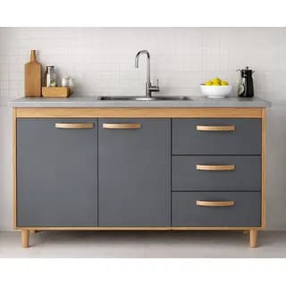 A modern, freestanding kitchen sink cabinet featuring a grey countertop with an integrated stainless steel sink and a gooseneck faucet. The cabinet body is made of light-colored wood, housing two grey cabinet doors on the left and three grey drawers on the right, all with wooden semi-circular pull handles. The unit stands on four short, tapered wooden legs. — 3D model