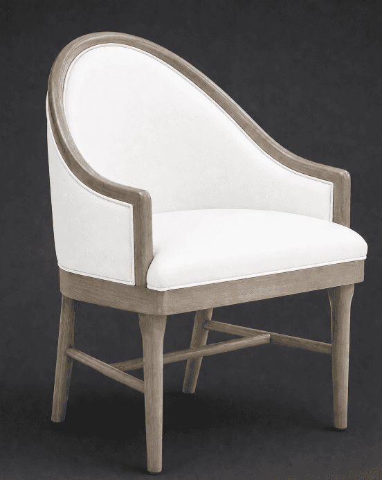 A contemporary armchair with a gracefully curved back and arms, upholstered in white fabric. The fra… — 3D model