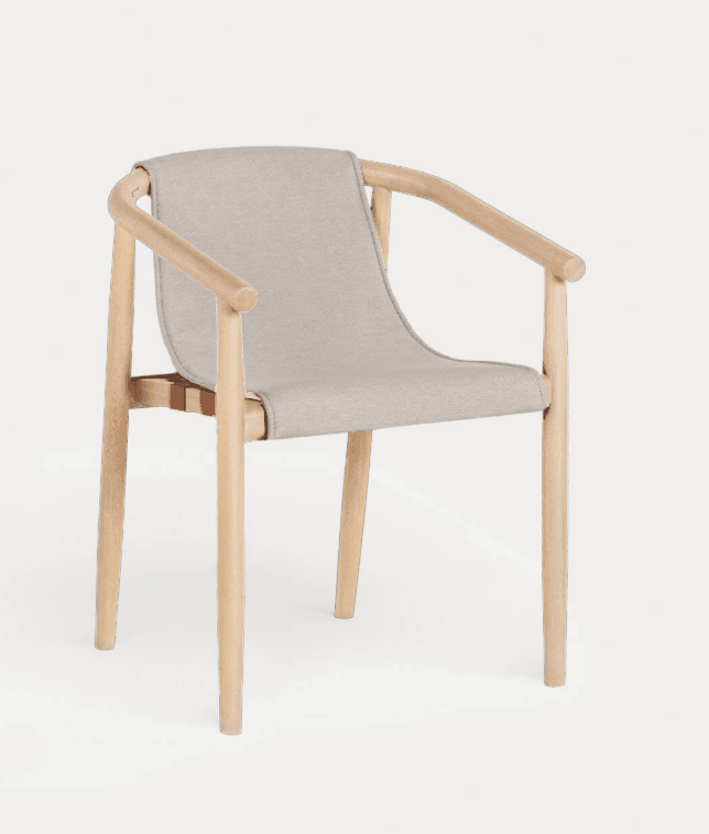 A modern armchair featuring a light-toned wooden frame and a sling-style fabric seat and backrest. The frame appears to be constructed from bentwood, forming curved armrests that seamlessly connect to the back supports. The seat and back are formed by a single piece of light beige fabric, which is suspended within the wooden frame, secured at the rear with visible leather straps. The chair has a minimalist and contemporary aesthetic. — 3D model
