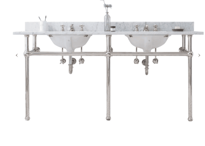 A double basin vanity with a marble top and backsplash, supported by a polished metal frame. Each ba… — 3D model