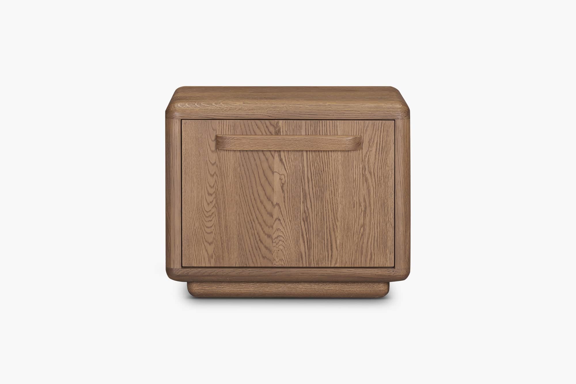 A compact, modern nightstand crafted from oak wood, featuring soft, rounded edges on its top, sides,… — 3D model