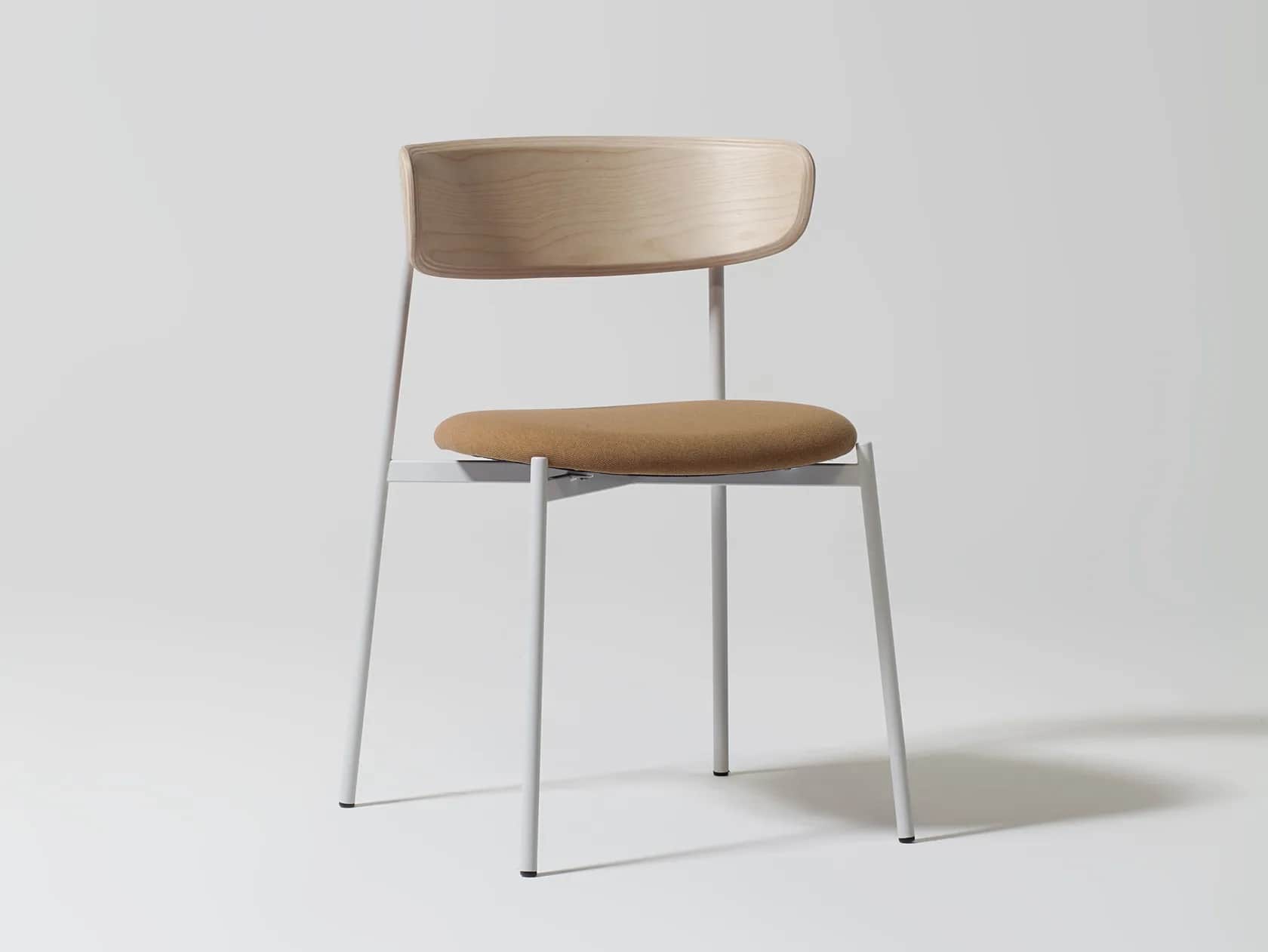 A modern dining chair with a bentwood backrest and a fabric-upholstered seat, supported by a slender… — 3D model