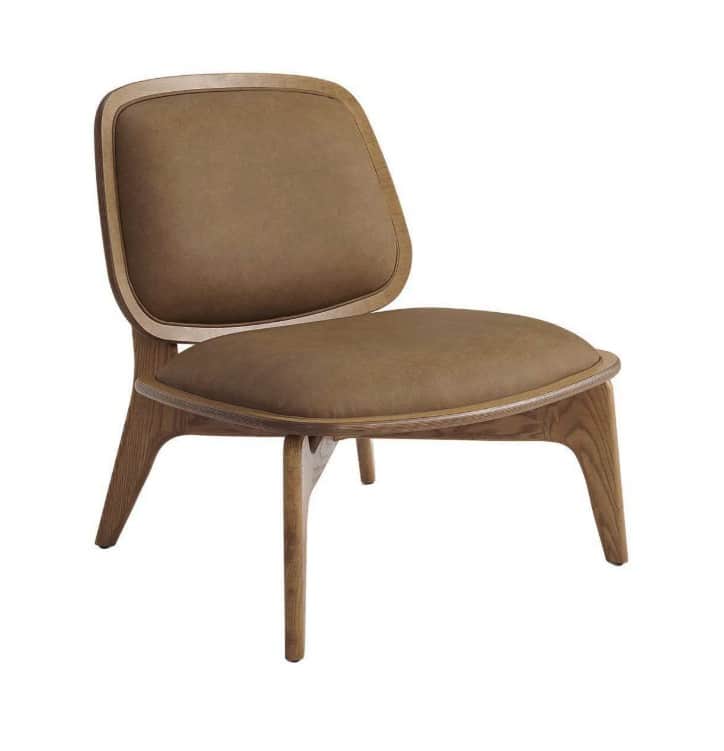 A modern lounge chair with a wooden frame and upholstered seat and backrest. The chair features a cu… — 3D model