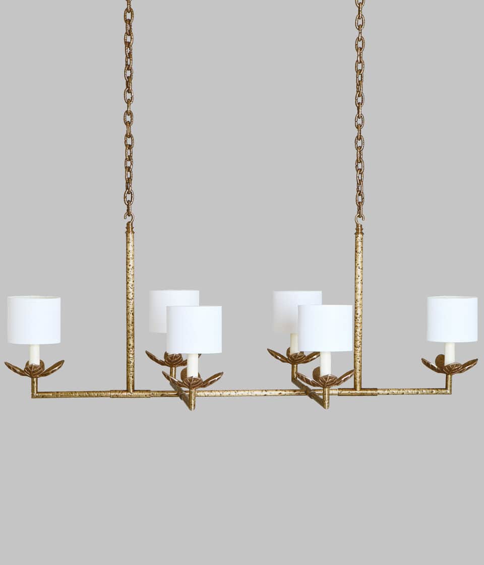 A linear chandelier suspended by two chains. The fixture has a horizontal bar with six lights, each… — 3D model