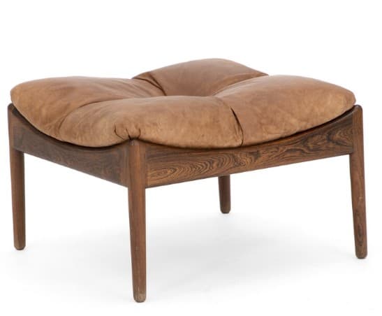 A Mid-Century Modern ottoman featuring a dark-grained rosewood frame with elegantly curved rails and tapered round legs, supporting a plush, light brown tufted leather cushion. — 3D model