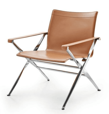 A modern lounge chair with a chrome-plated steel frame and tan leather upholstery. The chair features a minimalist design with thin armrests and a slightly reclined back. — 3D model