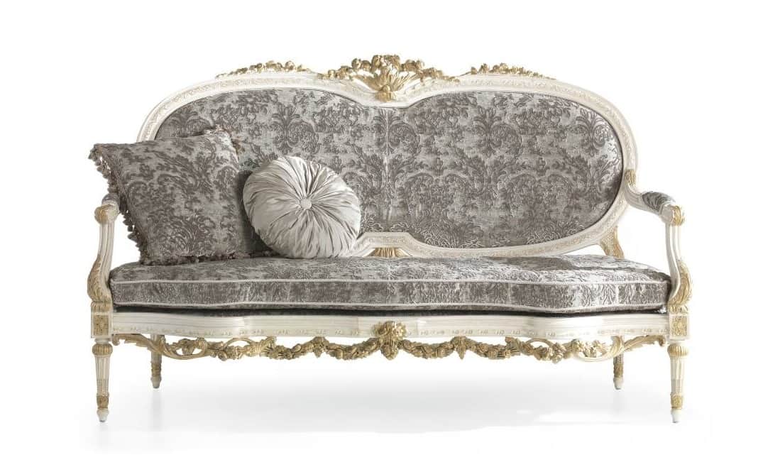 A highly ornate sofa with a carved wooden frame and upholstered seating and backrest. The frame is p… — 3D model