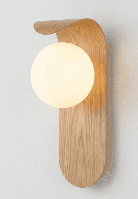 A modern wall sconce featuring a curved, bentwood backplate that partially wraps around a spherical… — 3D model