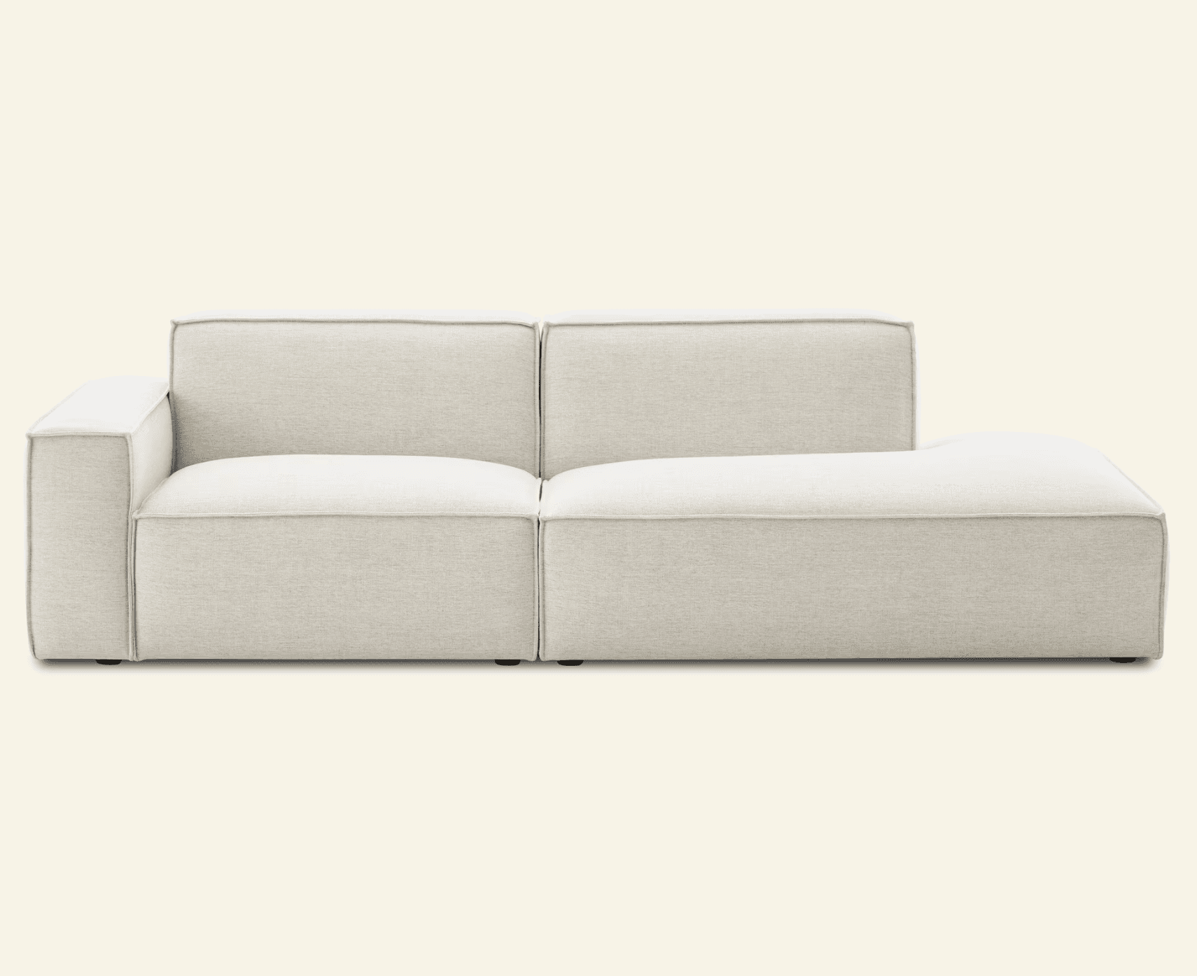 A light-colored, contemporary sectional sofa composed of two modules, one with a left armrest and on… — 3D model
