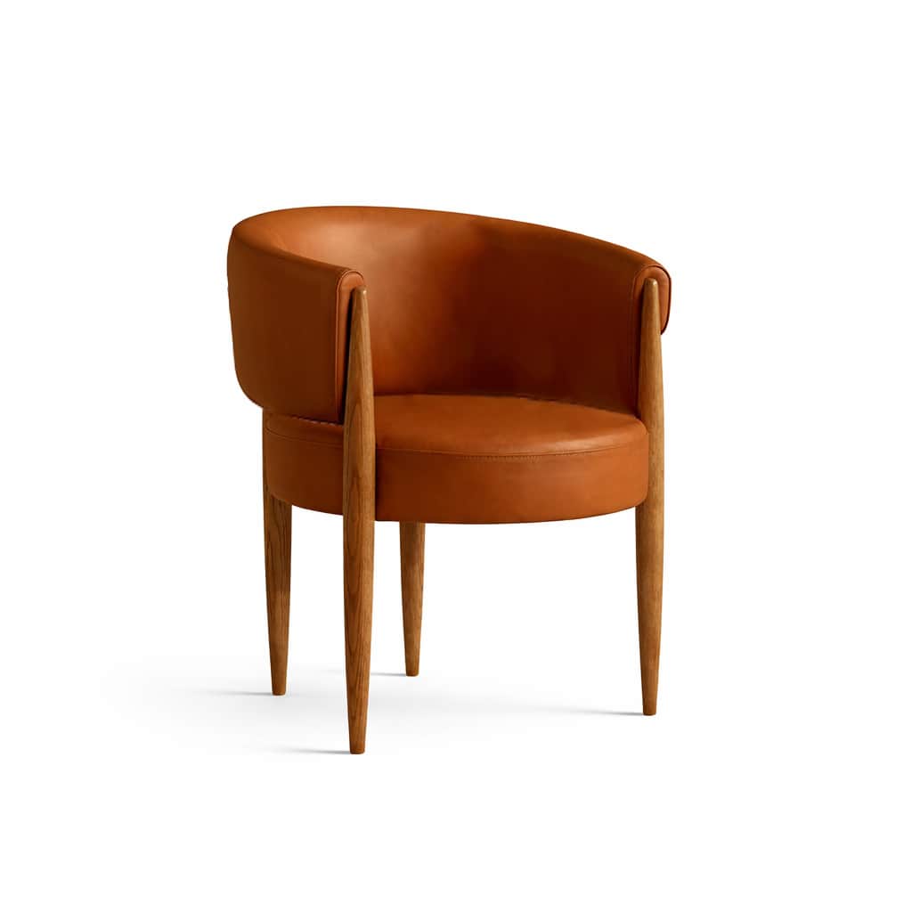 A contemporary armchair featuring a distinctive barrel back design, upholstered in a rich tan leathe… — 3D model