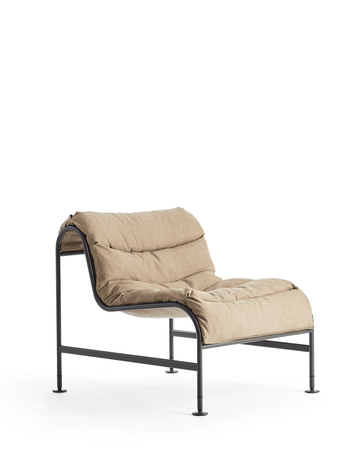 A contemporary lounge chair featuring a minimalist black metal frame that curves to support a deeply cushioned, upholstered seat and backrest. The frame is constructed from bent tubular metal, forming the legs and the continuous support for the textile cushions. The upholstery is a light beige or tan fabric, providing a soft contrast to the dark frame. The design is low-profile and appears designed for comfort and casual lounging. — 3D model