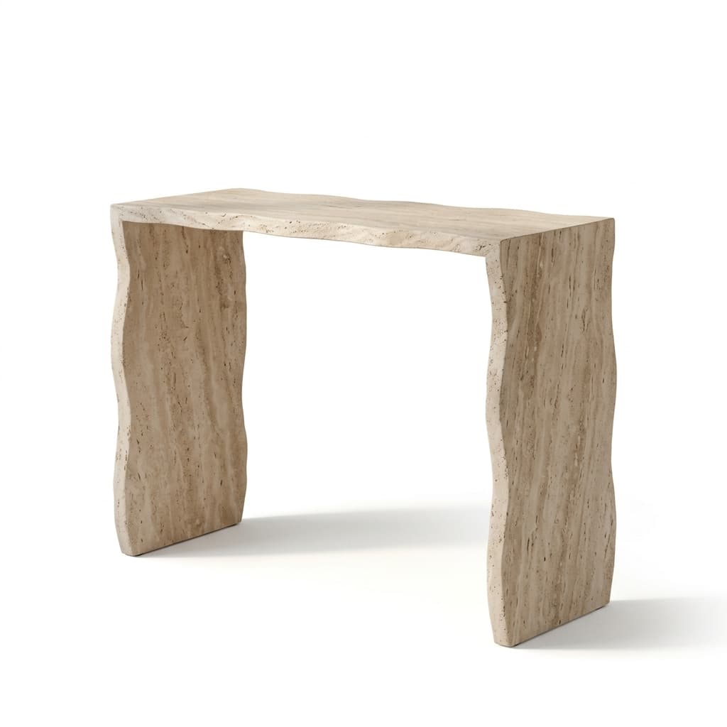 A console table crafted entirely from light-colored travertine stone, featuring a monolithic, C-shaped design. The most distinctive characteristic is the irregular, organic, or wavy edges that define the top and side panels, giving it a raw, sculptural aesthetic. The travertine exhibits natural porosity, veining, and a matte finish, emphasizing its natural material quality. The table appears new and in excellent condition. — 3D model