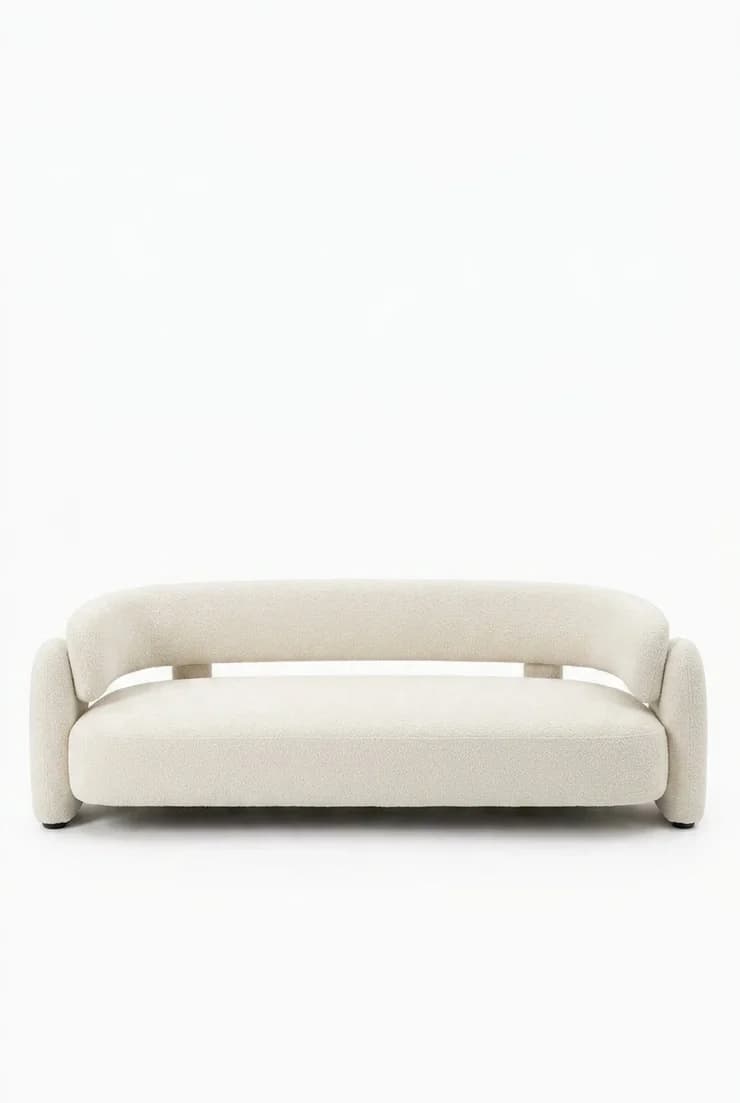 A modern two-seater sofa upholstered in a cream-colored boucle fabric, characterized by its minimalist design, rounded edges, and a continuous curved backrest that seamlessly transitions into integrated armrests. — 3D model
