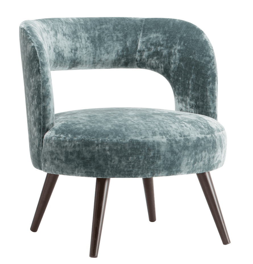 A velvet upholstered armchair with a rounded, C-shaped backrest and a circular seat. The chair has four tapered wooden legs that angle outwards. The upholstery has a crushed velvet texture. — 3D model