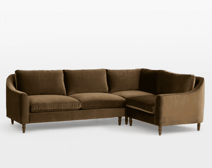 An L-shaped sectional sofa upholstered in a warm, dark brown velvet fabric. The sofa features classi… — 3D model