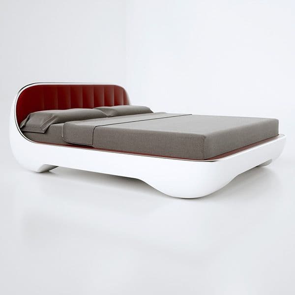 A modern and futuristic platform bed featuring a curvilinear, low-profile white lacquered frame that seamlessly integrates a striking red upholstered headboard. The bed is shown with grey bedding, complementing its sleek design. — 3D model