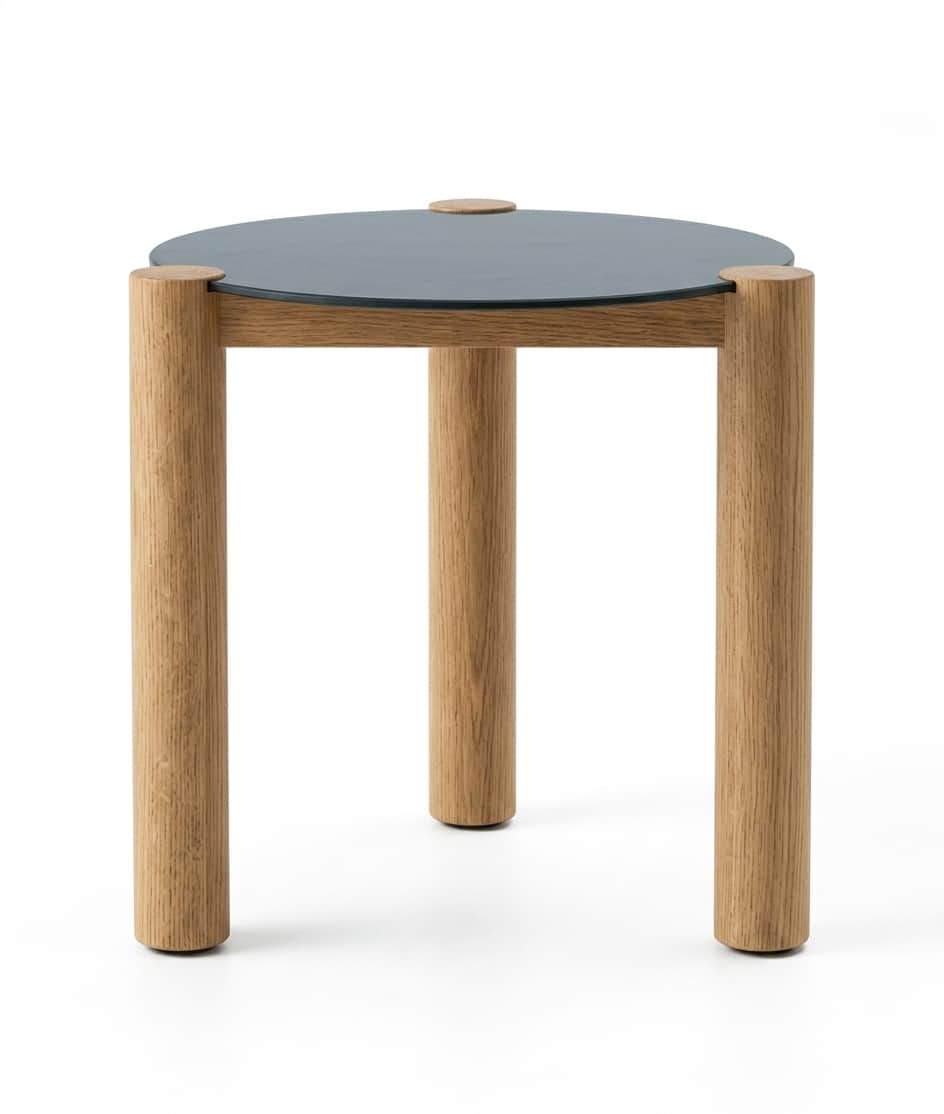 A minimalist round side table featuring three cylindrical wooden legs and a circular frosted dark gr… — 3D model