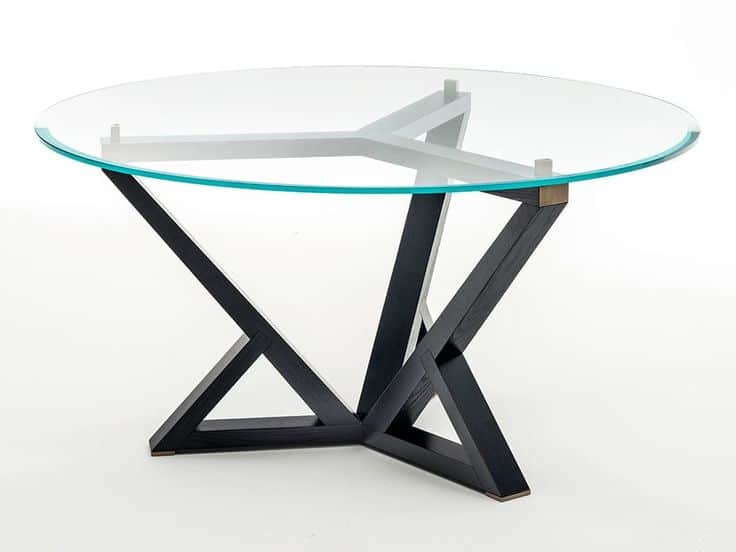 A round dining table featuring a clear glass tabletop and a distinctive geometric base. The base is… — free OBJ 3D model
