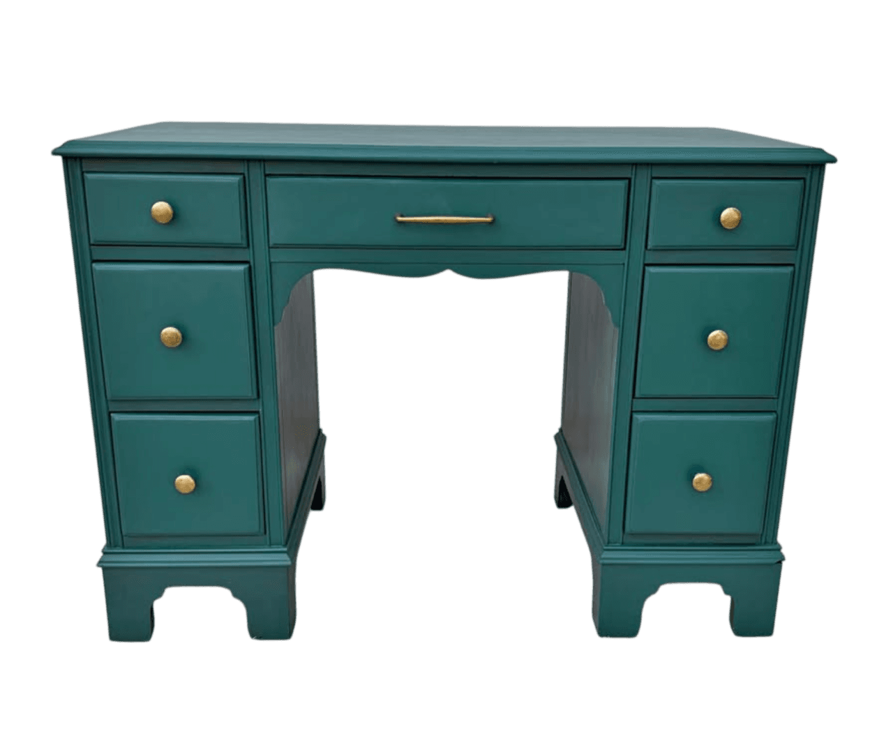 A dark teal painted desk with gold hardware. The desk features a central drawer with a long gold pull handle, flanked by two sets of drawers on either side. The left side has three drawers stacked vertically, and the right side also has three drawers stacked vertically. All drawer fronts have round gold knob hardware. The desk has a scalloped apron underneath the central drawer and is supported by four legs with decorative bases. The color is a deep teal-green, and the hardware is a brushed gold or brass. — 3D model
