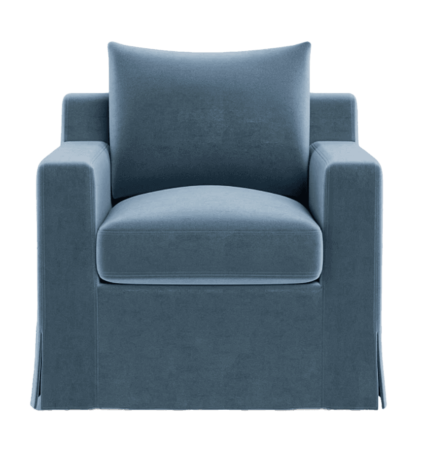 A plush, slipcovered armchair with a skirted base and a single throw pillow. The armchair features a… — 3D model