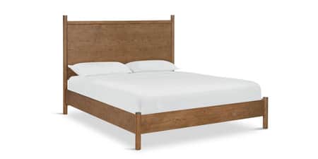 A queen-size wooden platform bed featuring a tall, paneled headboard and a minimalist frame. The bed… — 3D model