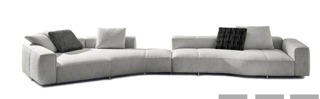 A contemporary, modular, curved sofa with a light gray fabric upholstery. The sofa features a low pr… — free OBJ 3D model