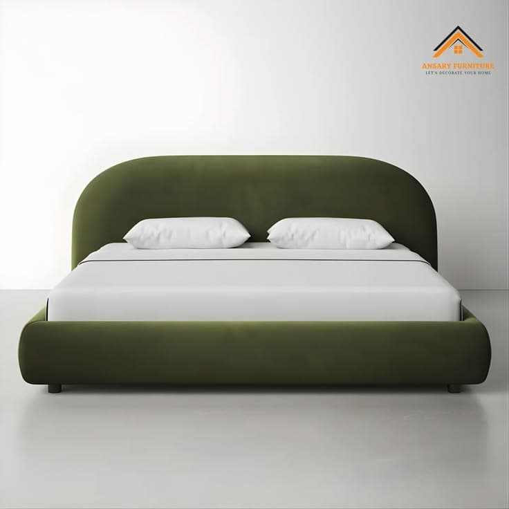 A modern upholstered platform bed featuring a distinctive asymmetrical curved headboard and a low-profile frame, all covered in a soft olive green fabric. — 3D model