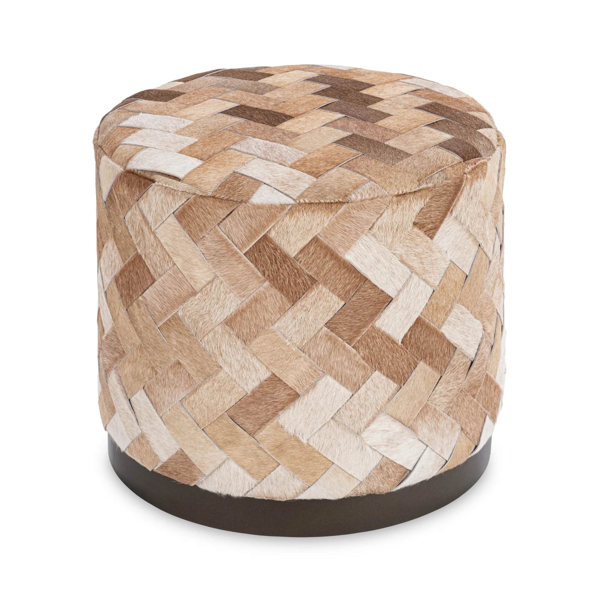 A cylindrical ottoman upholstered with a patchwork of cowhide in various natural shades, arranged in… — 3D model