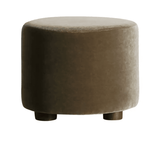 A round, plushly upholstered ottoman in a muted, warm gray or taupe velvet fabric, standing on four short, dark wooden feet. — 3D model