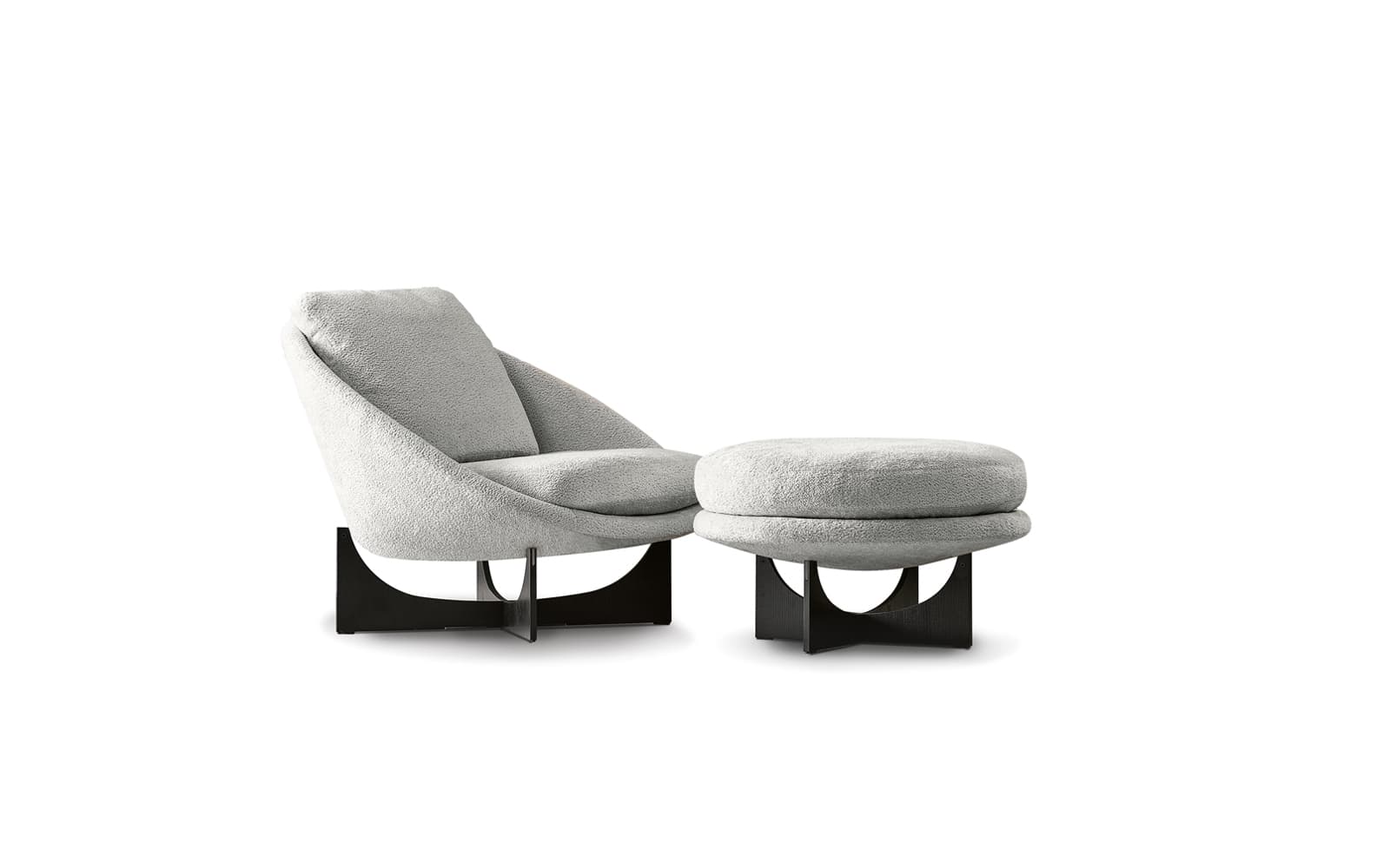 A modern armchair and ottoman set. The armchair features a rounded, enveloping silhouette with plush, textured upholstery. It is supported by a dark, angular base with intersecting curved elements. The accompanying ottoman shares a similar rounded, upholstered top and a matching dark base. — 3D model