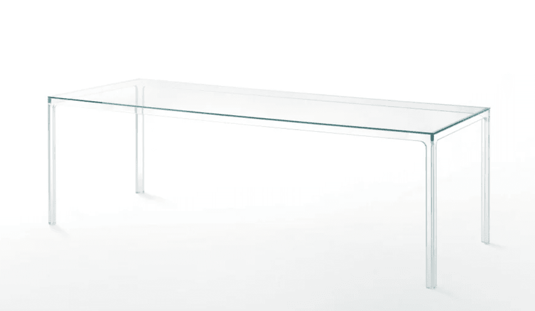 A minimalist, rectangular table constructed entirely from clear glass, featuring a transparent top and legs that are seamlessly integrated into the design. — 3D model