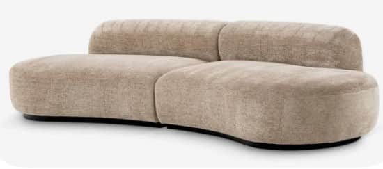 A contemporary modular sofa featuring a distinct serpentine curve, composed of two separate pieces d… — 3D model