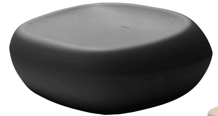 A modern, freeform stool with a smooth, matte finish. The stool has an organic, pebble-like shape, wider at the base and tapering slightly towards a flat top surface. It lacks visible legs, suggesting it might be a solid block or have an integrated base. — 3D model