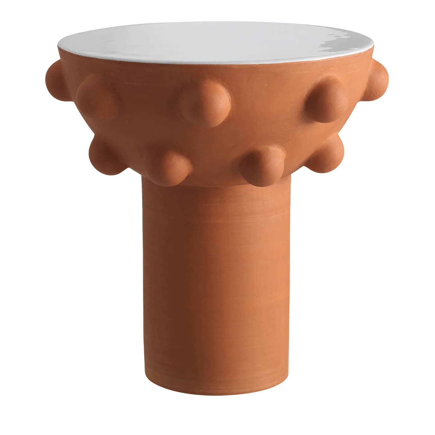 A terracotta side table with a white, glossy top. The base of the table, below the tabletop, features a decorative band with multiple rounded protrusions arranged in a circular pattern. The pedestal base is cylindrical and appears to be made of unglazed terracotta. — 3D model