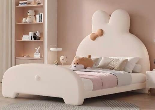 A children's bed with a playful, cartoonish design, featuring a headboard shaped like a rabbit's ear… — free BLEND 3D model