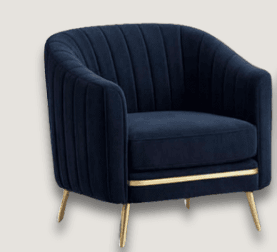 An elegant barrel-shaped accent armchair upholstered in navy blue velvet. It features vertical channel tufting on the backrest and arms, integrated armrests, and a removable seat cushion. The chair is supported by four tapered gold metal legs and includes a horizontal gold accent trim on its lower frame. — 3D model