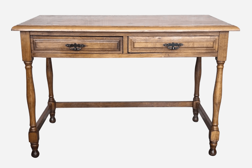A rustic wooden console table featuring a rectangular tabletop and two aligned drawers situated below the surface. The table is supported by four turned legs connected by a horizontal stretcher bar, adding to its stability and traditional aesthetic. Each drawer is adorned with an ornate, dark metal pull. — 3D model