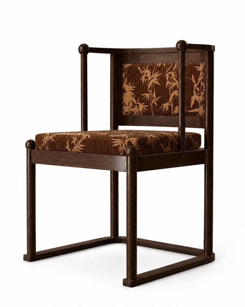 A dark wood armchair with upholstered seat and backrest. The upholstery features a repeating pattern of bamboo stalks and leaves in a contrasting brown and beige color scheme. The chair has a rectilinear frame with rounded finials at the top of the back supports. — 3D model